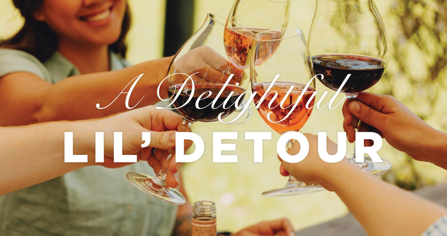 a group of people clinking wine glasses with text A Delightful Lil Detour