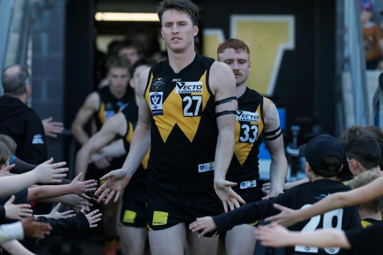 team coming out to the field