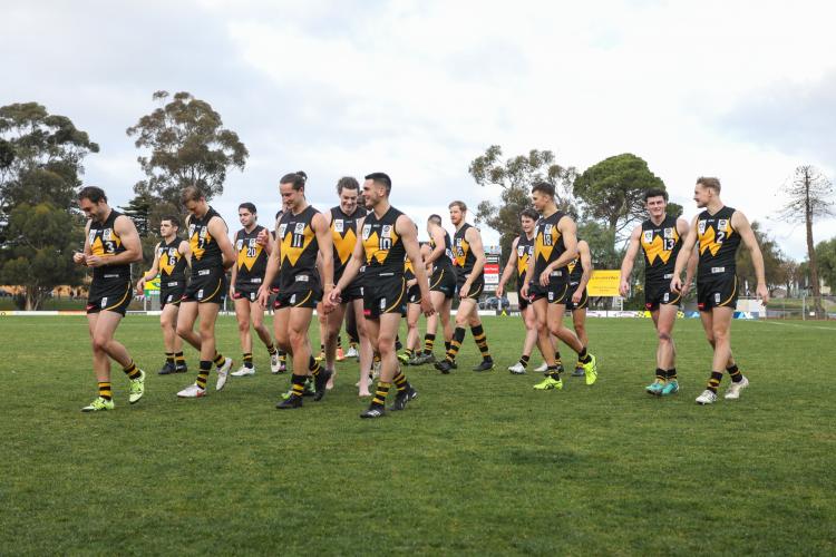 Werribee team leaving the ground 