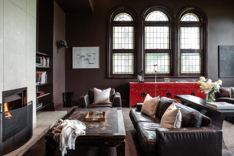 A couch and coffee table in lounge area of Lancemore Mansion Hotel Werribee Park