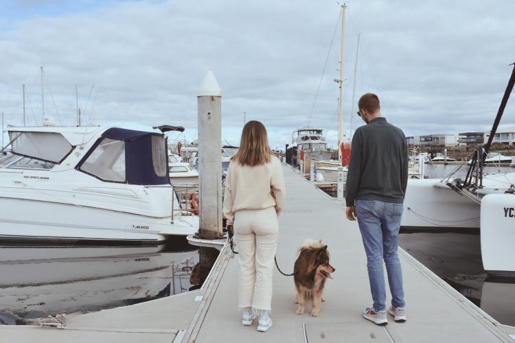 Couple with dog marina