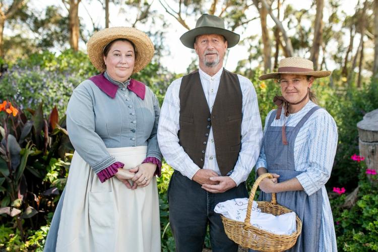 staff dressed in their costumes waiting to greet visitors
