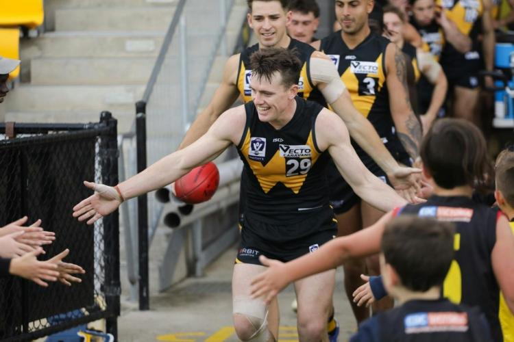 team going on the field