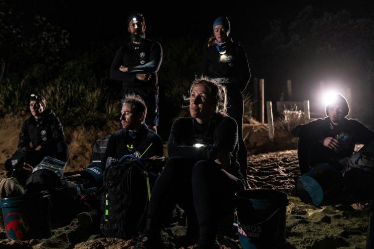 A group of competitors get a briefing.