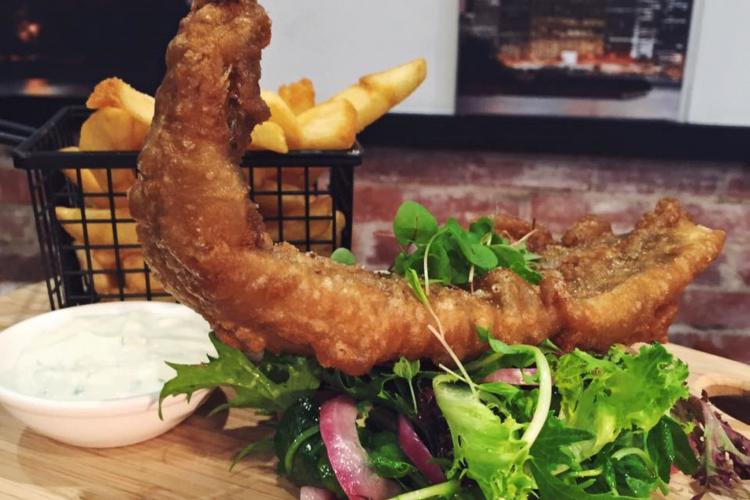 fish and chips dish with side salad