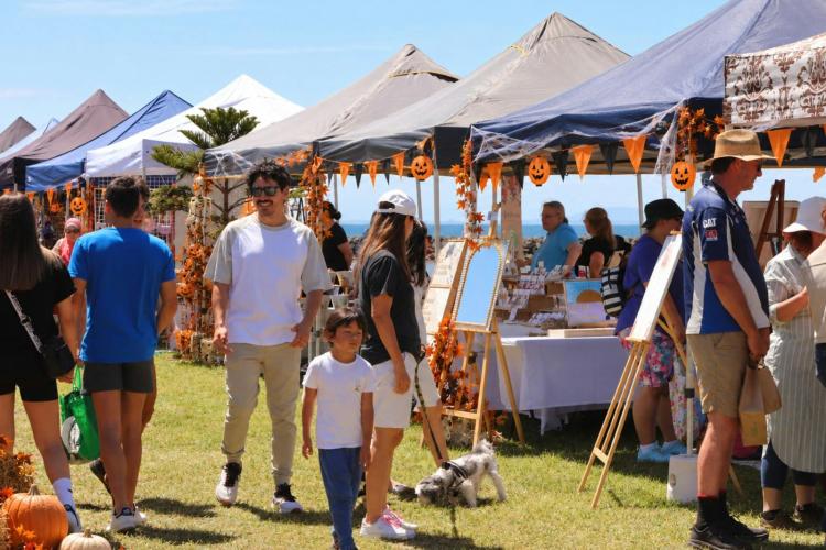 Families enjoying Halloween fun at the Wyndham Harbour Markets,