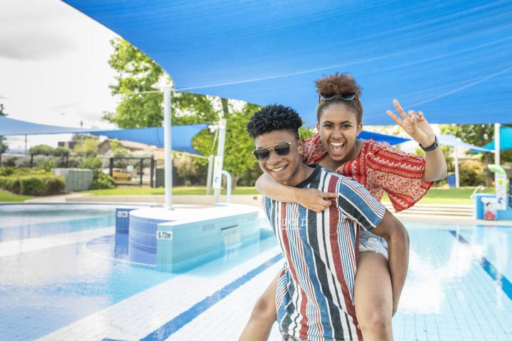 Teenage couple at Werribee Outdoor Swimming Pool